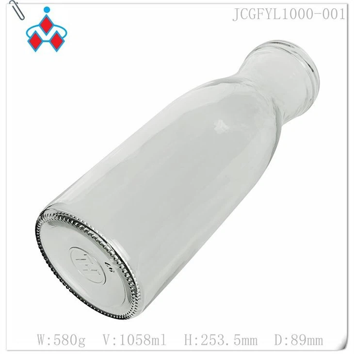 Glass orange juice bottle in stock